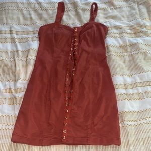 Orange dress with gold buttons